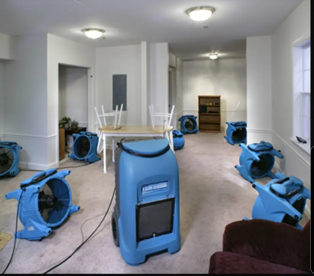 Air movers and dehumidifier setup for Water Damage Restoration in North Ogden